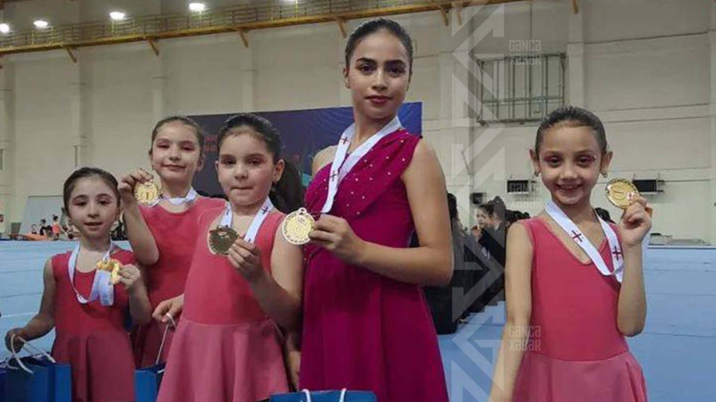 Gimnastlarımız Gürcüstandan Vətənə qızıl medalla dönüblər