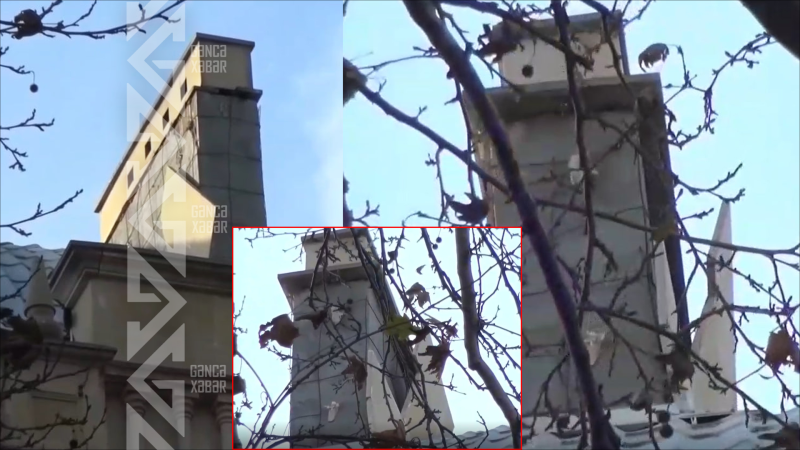 TƏHLÜKƏ: Gəncədə binanın damından iri aqlay parçası sallanır - VİDEO