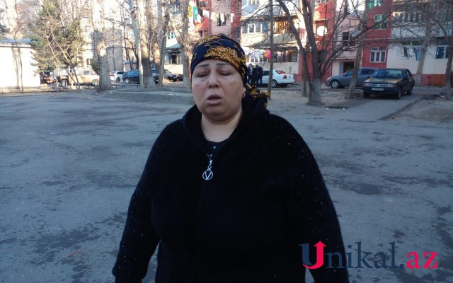 Əri yıxılaraq ölən qadın onu maşın vurduğunu iddia edir