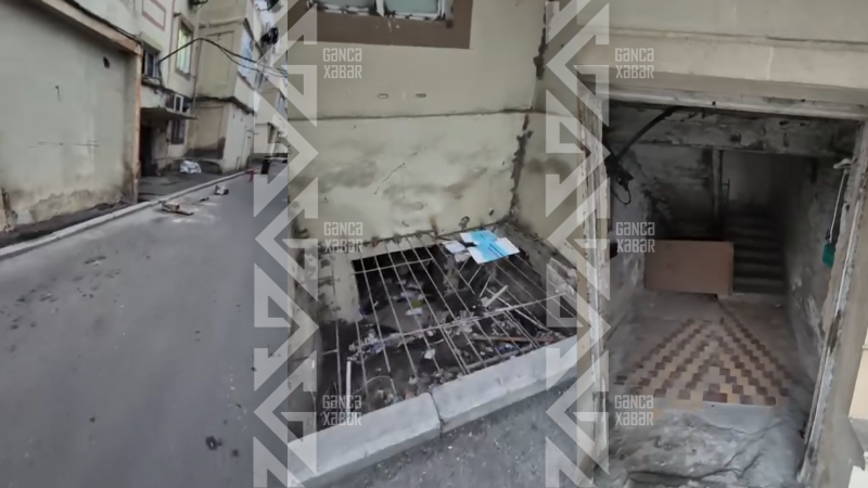 Gəncədə bu bina çirkab içində batır