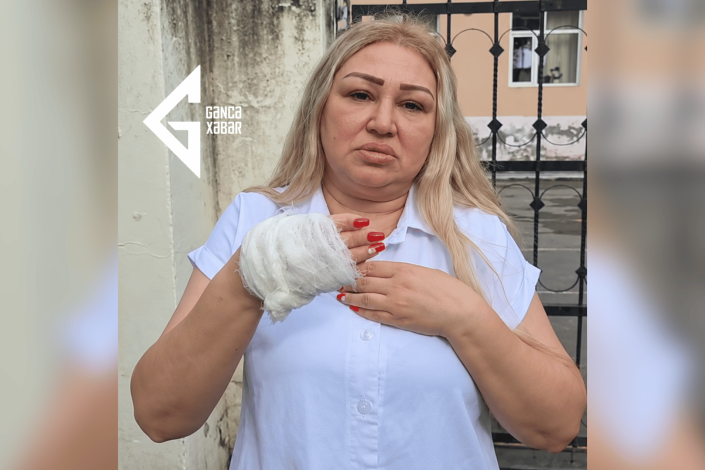 Döyülən müəllimə: "Telefonumu başımda qırdı"