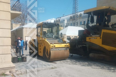 Bir neçə binanın qarşısına asfalt örtüyü salınır