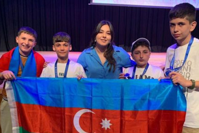 Məktəblilər Beynəlxalq Olimpiadadan medal ilə dönüblər