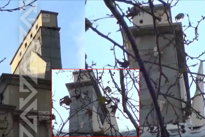 TƏHLÜKƏ: Gəncədə binanın damından iri aqlay parçası sallanır - VİDEO