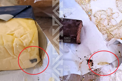 Sürpriz dolu alış-veriş: Kifli yağ və qurdlu konfet