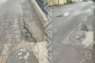 Gəncədə yeni asfaltlanan kələ-kötür yol